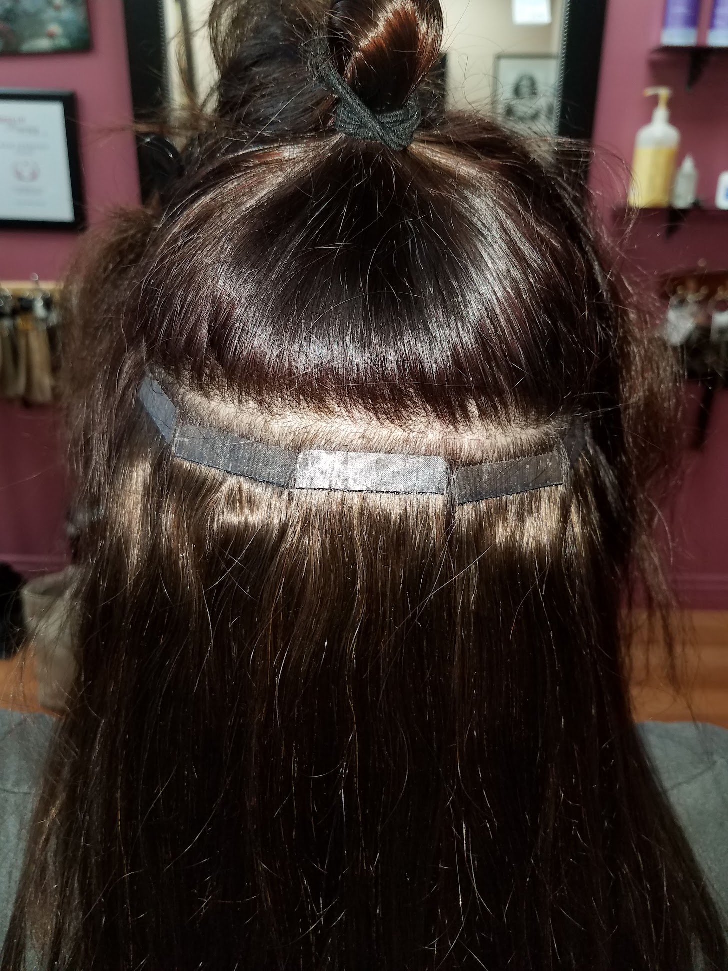 tape In hair extensions technique in process